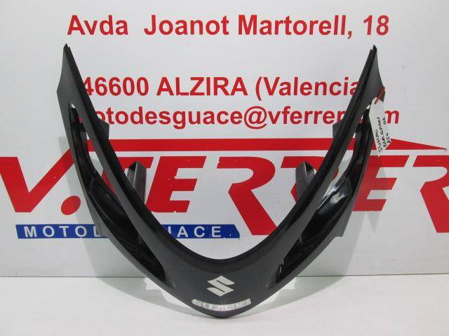 Tapa frontal de repuesto de una moto Suzuki Burgman 150 azul del año 2002